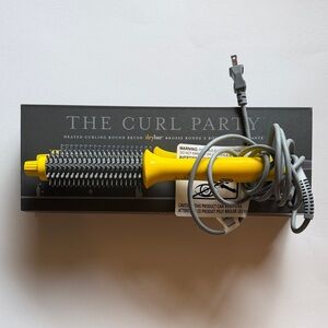 Drybar Heated Round Brush in Yellow with Gray Bristles